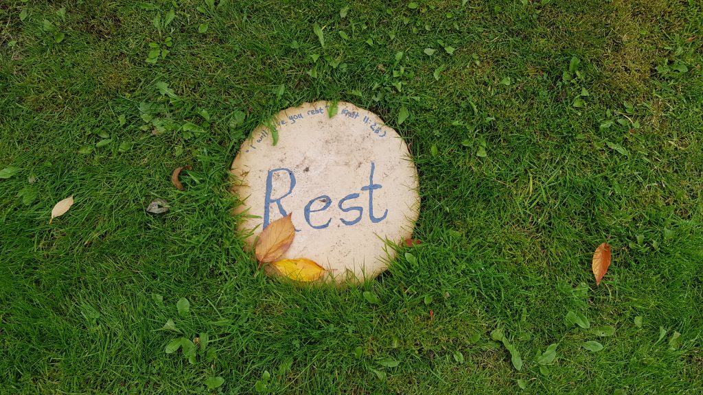 Church garden - stone with verse on 'Rest'