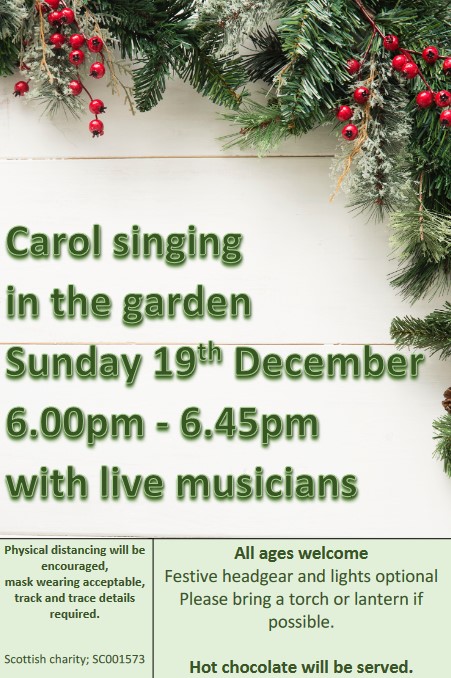 Poster with information on carol singing in garden on Sunday 19th December, 6 to 6.45 PM with live musicians. Holly wreath as background image.